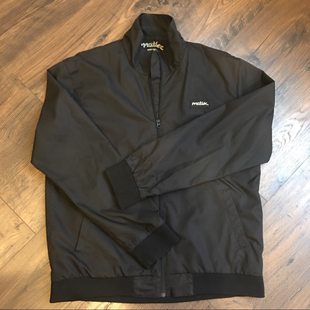 Magic men’s black windbreaker jacket.